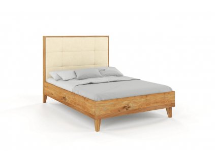 Manželská posteľ z dubového dreva s vysokým čalúneným čelom a vysokými nohami, pohľad zboku.
